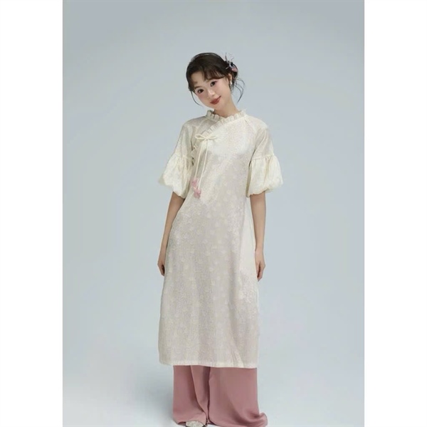 Áo dài be tay bồng nơ