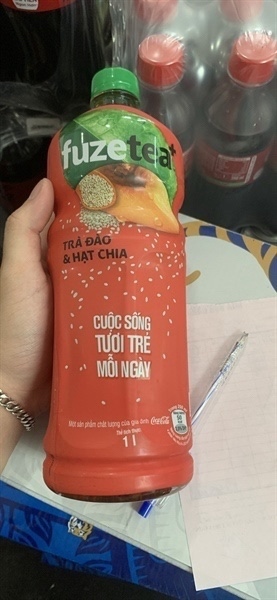 Trà đào hạt chia chai 1 lít