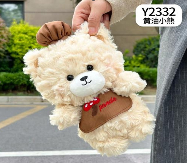 Gấu kem cầm túi xách da nâu 20cm 52,1k/c (lố 5)